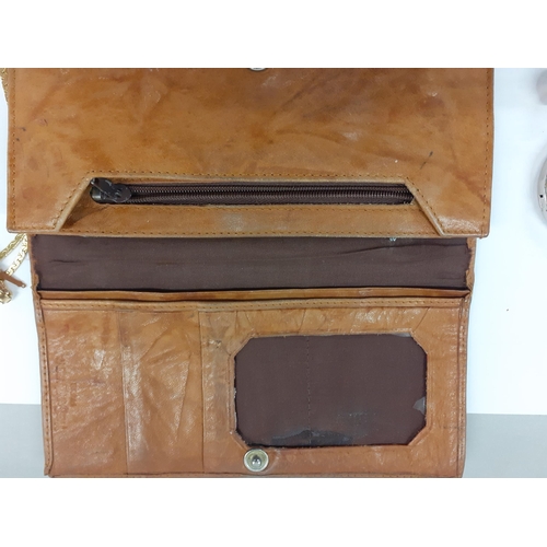 125 - YSL-A vintage brown leather YSL purse A/F together with a quantity of costume jewellery to include p... 