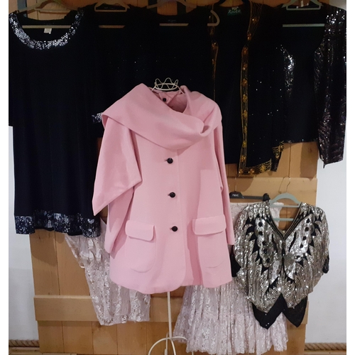 126 - A quantity of mixed ladies clothing to include an Escada baby pink swing coat, European size 42 with... 