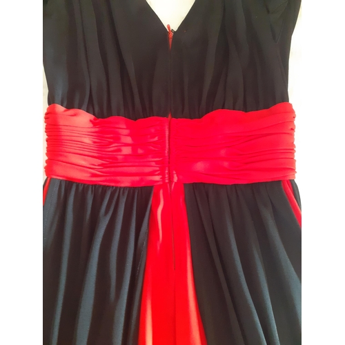 28 - Loris Azzaro, Paris-A late 20th Century red and black evening gown, 24/26