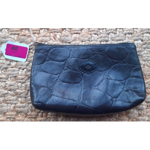 60 - A late 20th Century Mulberry black leather zipped pouch in a crocodile print with gold tone hardware... 