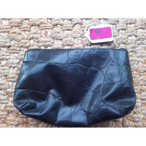 60 - A late 20th Century Mulberry black leather zipped pouch in a crocodile print with gold tone hardware... 