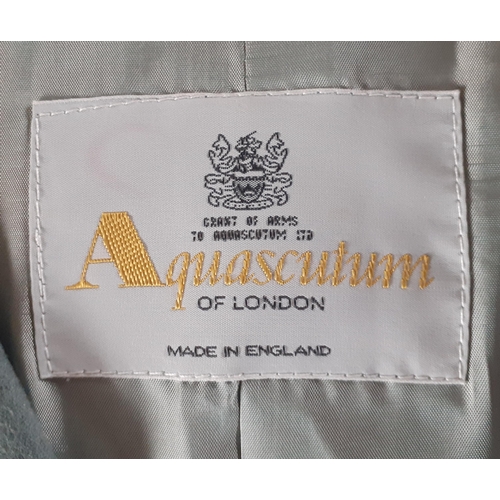 63 - Aquascutum-Three items of ladies country-wear outer garments comprising an Aquascutum fern green woo... 