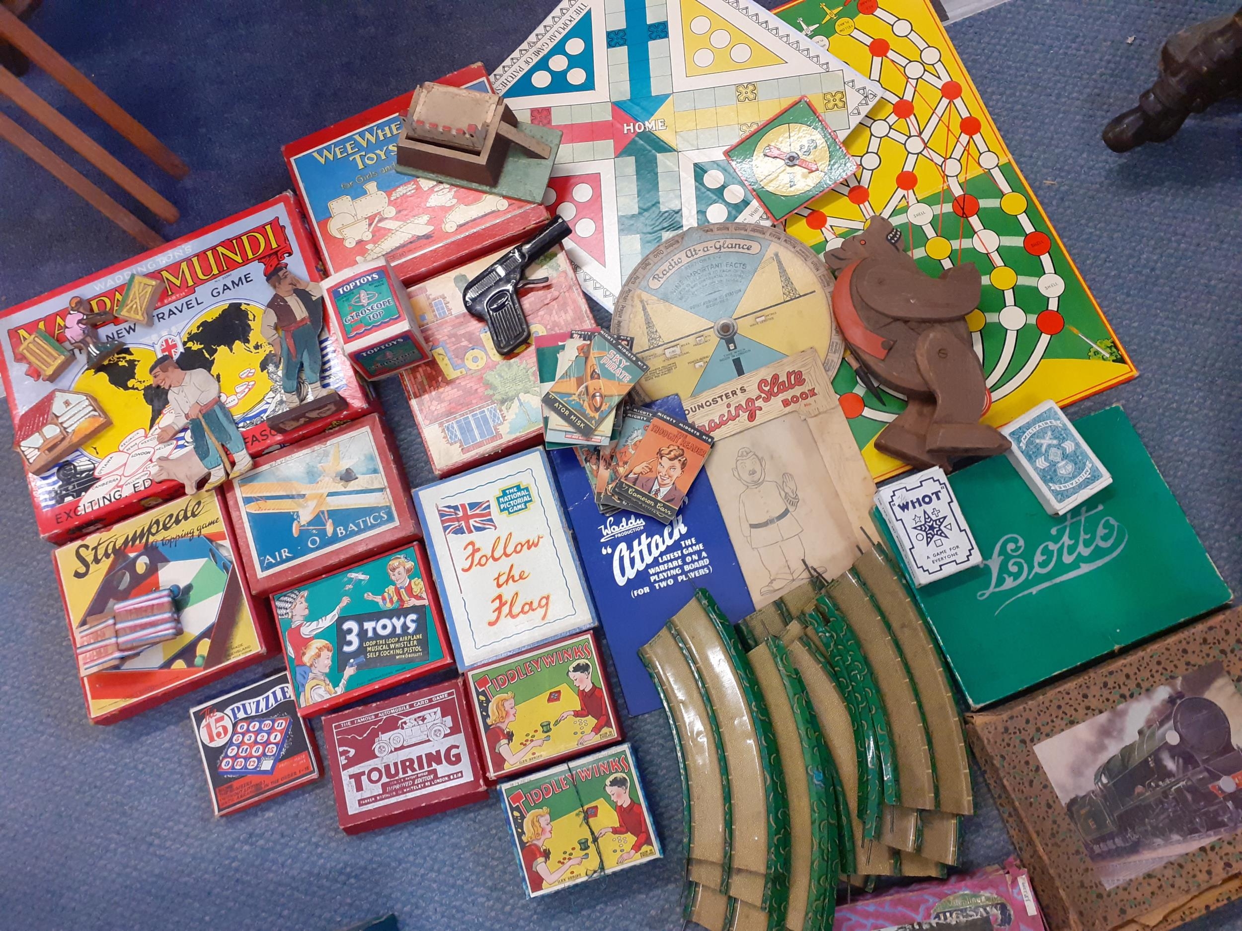 A quantity of vintage children's games and toys to include Mappa Mundi