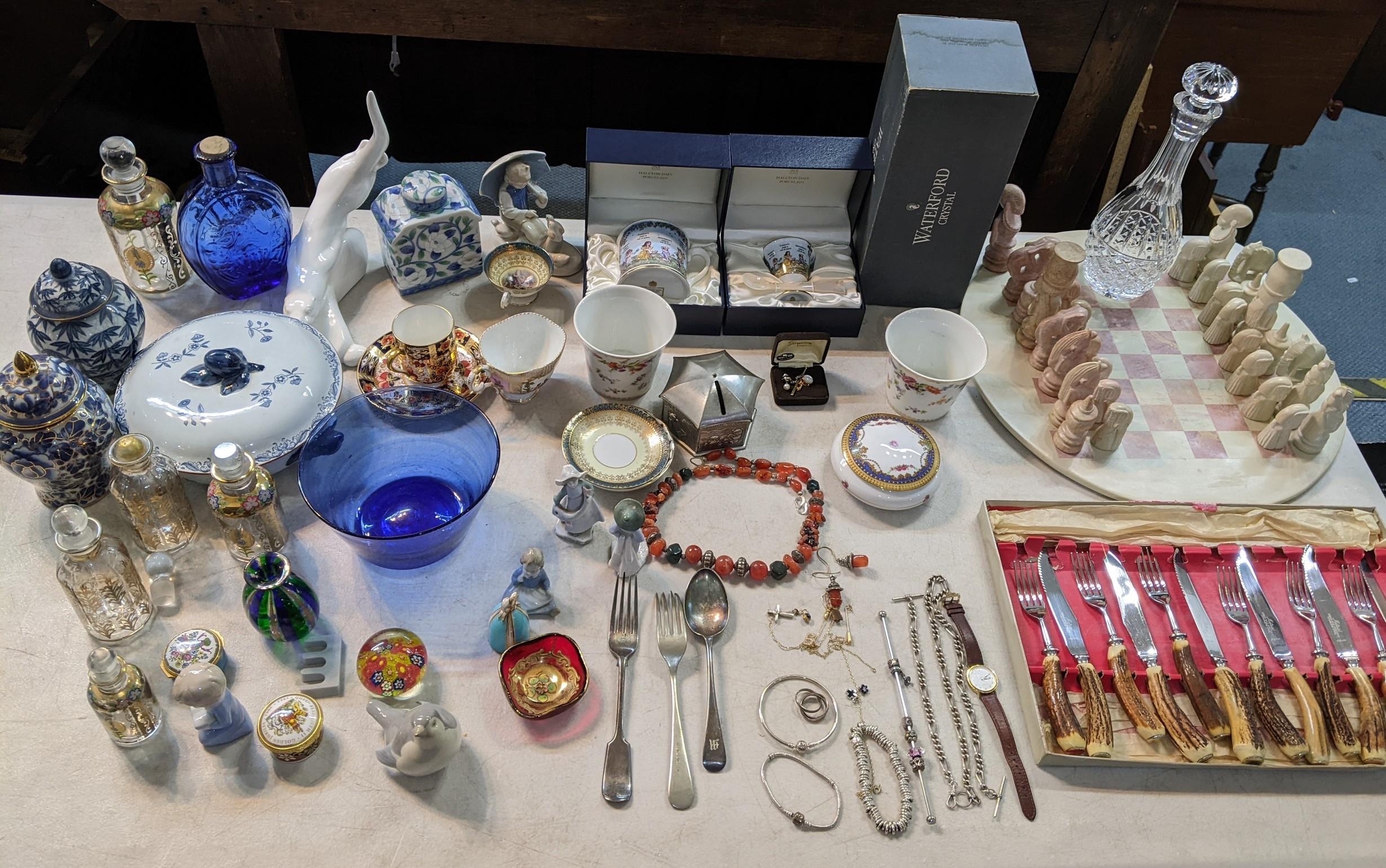 A mixed lot to include a boxed Waterford decanter, chess set, cutlery