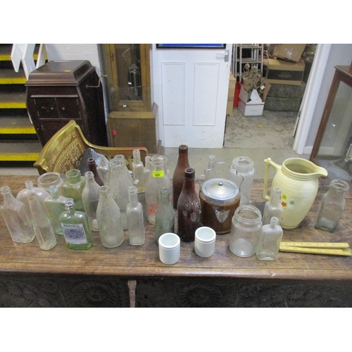 348 - A selection of glass bottles, an oak biscuit barrel and other items
Location: LWB/LAF