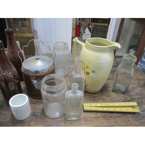 348 - A selection of glass bottles, an oak biscuit barrel and other items
Location: LWB/LAF