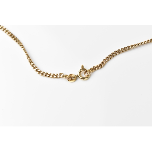 120 - A 9ct yellow gold flat curb link chain necklace with a George V, 1911 sovereign coin in a 9ct gold f... 