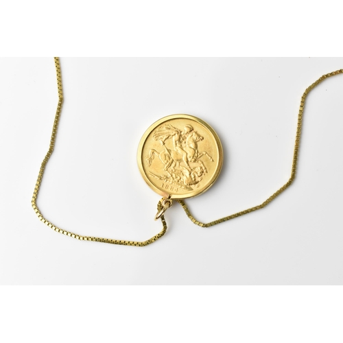 121 - A yellow metal box link chain necklace, together with a Victorian 1884 gold sovereign coin in a 9ct ... 