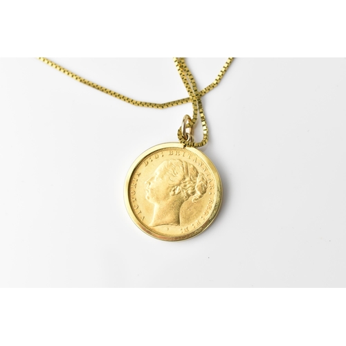 121 - A yellow metal box link chain necklace, together with a Victorian 1884 gold sovereign coin in a 9ct ... 