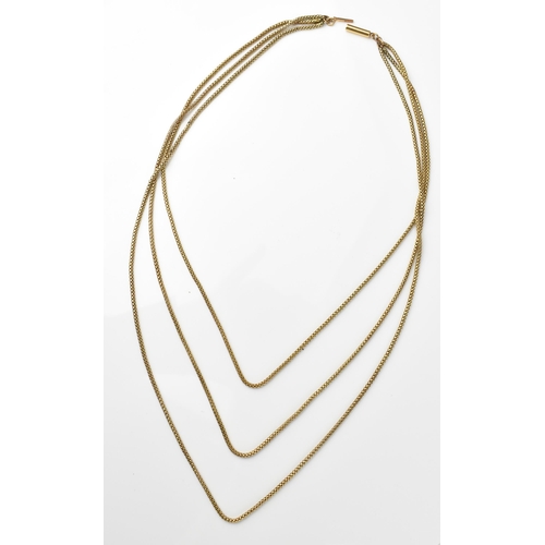 124 - A 9ct yellow gold three strand box chain necklace, with graduated strands joined by a bayonet clasp,... 