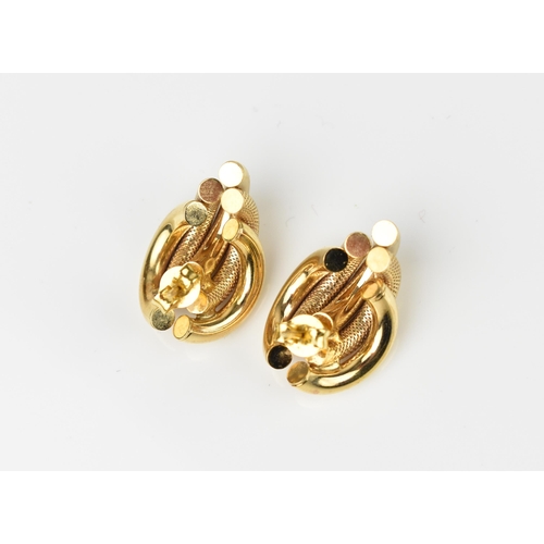 128 - A pair of 9ct yellow gold earrings, designed with alternating textured demi-hoops, combined weight 9... 