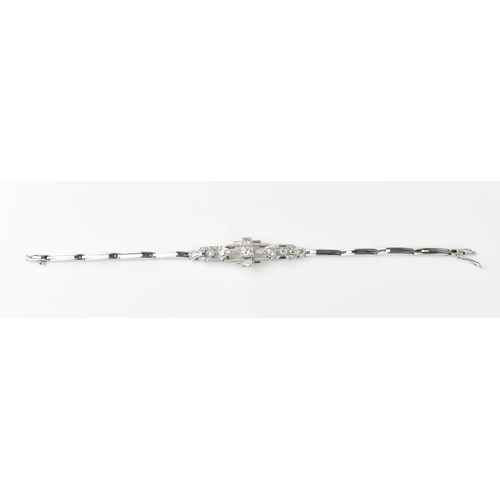 152 - An Art Deco 18ct white gold and diamond bracelet, with stretch bracelet, inset with thirteen central... 