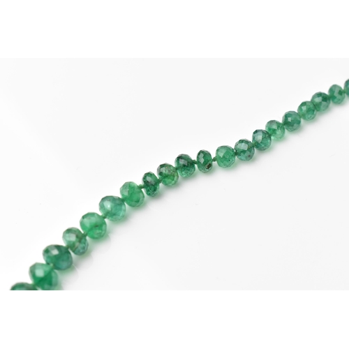 155 - A single strand graduated emerald bead necklace, with 9ct yellow gold and diamond clasp, stamped 375... 