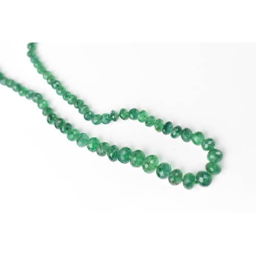 155 - A single strand graduated emerald bead necklace, with 9ct yellow gold and diamond clasp, stamped 375... 