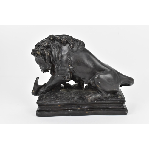 181 - In the style of Antoine-Louis Barye: a 19th century patinated bronze animalier sculpture of 'The lio... 