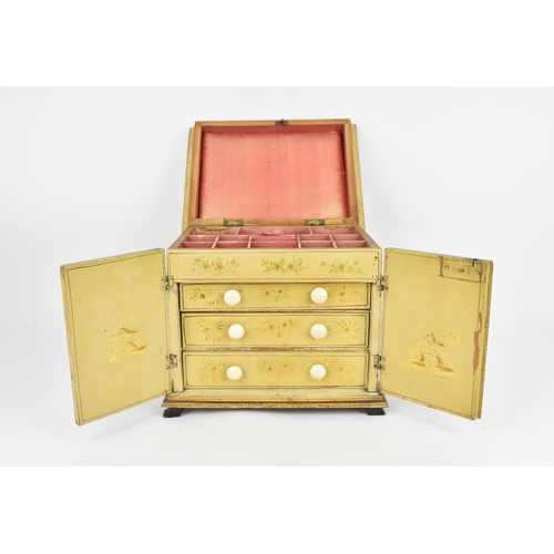 182 - A Regency period Chinoiserie yellow lacquered and painted vanity cabinet, with hinged lid decorated ... 