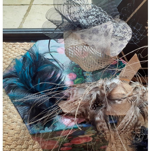 111 - A Nigel Rament ladies formal hat, new with original tags, an assortment of modern fascinators and ha... 