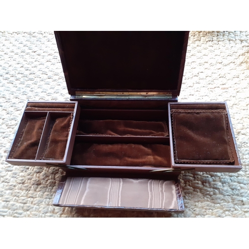 155 - A mid 20th Century faux crocodile, London made, travel jewellery case together with a mid 20th Centu... 