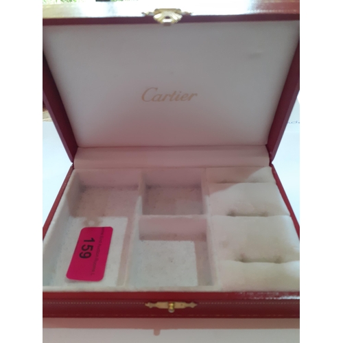 159 - A small red Cartier jewellery box:BWR