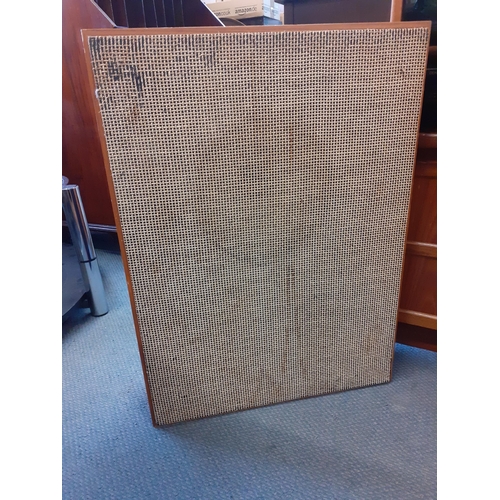 160 - A vintage music system in a teak housing unit with smoky glazed door above a record rack, comprising... 