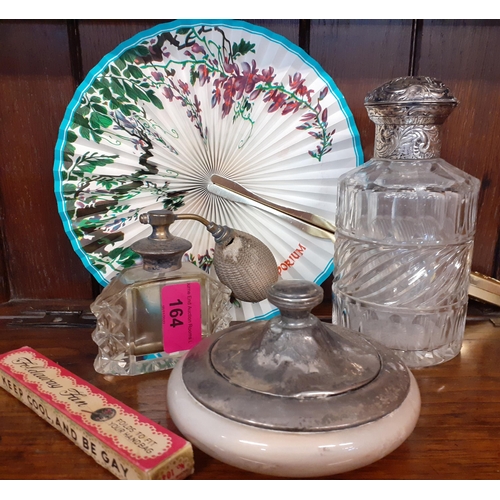 164 - Dressing table items to include a silver topped and glass powder pot, a silver topped scent bottle a... 