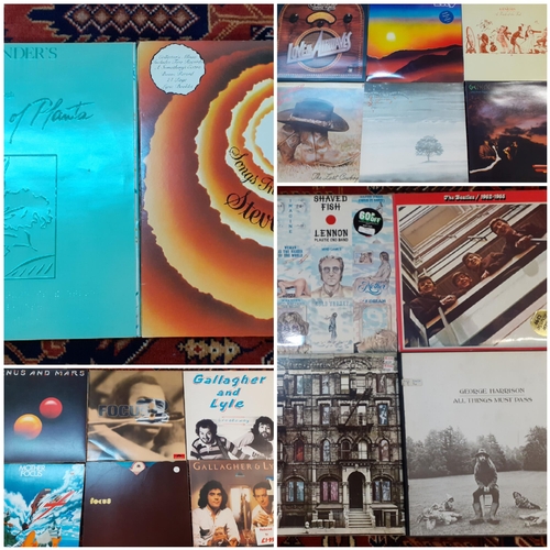 168 - A small collection of 1960's and later records to include The Beatles, Led Zeppelin, Focus, Gallaghe... 