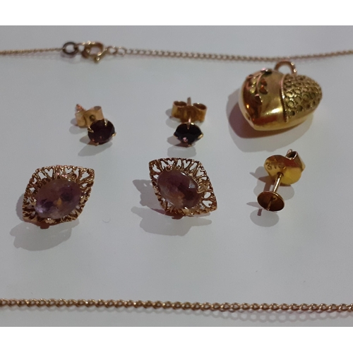 180 - A small quantity of 9ct gold jewellery comprising a fine chain, a pair of gold and amethyst pierced ... 