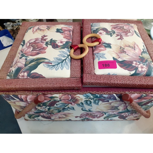 188 - A late 20th century sewing box and contents to include wooden Sylko and other cotton reels, thimbles... 