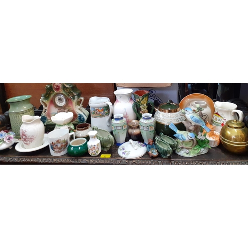 240 - Mixed 20th century ceramics and ornaments to include a Tulip pottery vase, an Alfred Meakin fairgrou... 