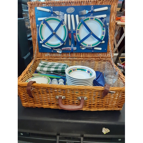 288 - An Optima for John Lewis picnic hamper and contents to include additional picnic ware together with ... 