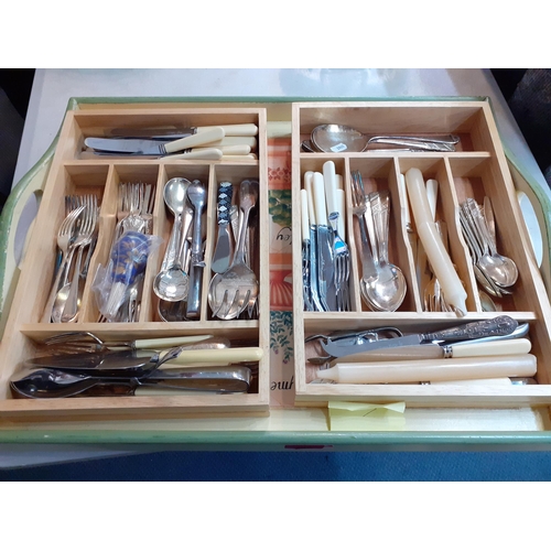 290 - Mixed cutlery and flatware to include silver plate together with a large painted twin handled tray
L... 