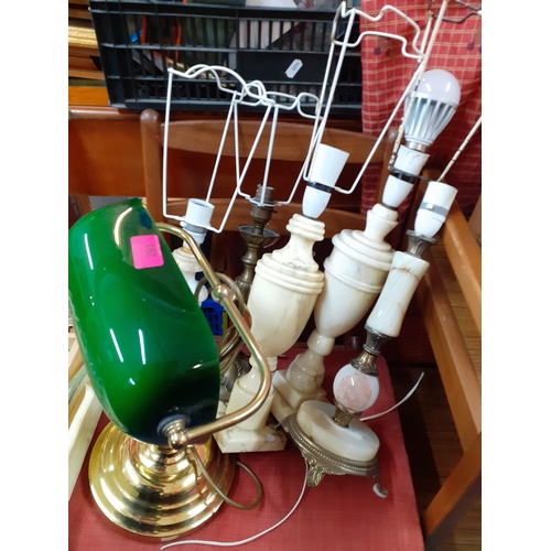 293 - A group of late 20th century onyx table lamps and others to include a brass reading light with green... 