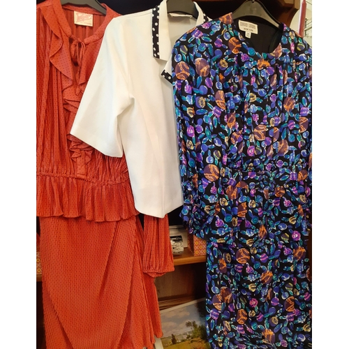 70 - A quantity of 1980's ladies clothing to include Maggy London silk dresses, a Peepers2 London coral 2... 