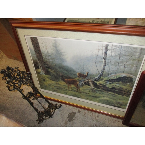 196 - A mixed lot of framed and glazed prints, brass picture stand, pair of plaster bookends depicting Lor... 