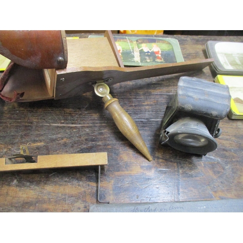 207 - A Victorian Stereoscope with various slides, a vintage Combes Bros bicycle lamp, a Hughes & Son Ltd ... 