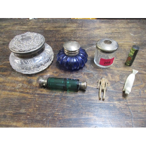 208 - A lot to include a Victorian green glass double ended scent bottle with white metal caps, a Grodnert... 