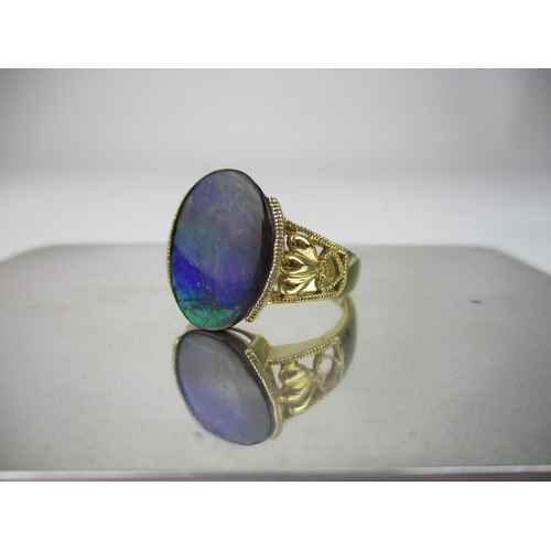 218 - A D'Yack 14k yellow gold and oval opal doublet ring, with beaded and pierced heart decoration to the... 