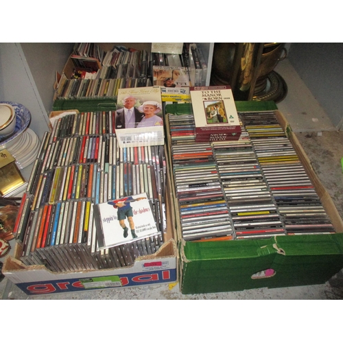 219 - A collection of various CDs to include Alison Moyet, Matt Munro, and Boney M, along with DVDs, boxed... 