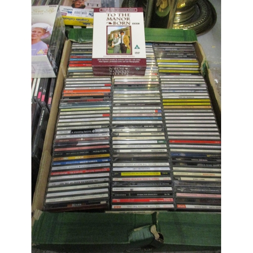 219 - A collection of various CDs to include Alison Moyet, Matt Munro, and Boney M, along with DVDs, boxed... 