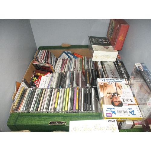 219 - A collection of various CDs to include Alison Moyet, Matt Munro, and Boney M, along with DVDs, boxed... 