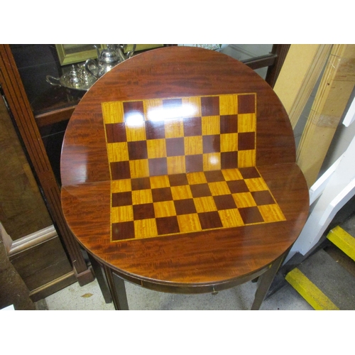 231 - A Waring & Gillows mahogany demi-lune foldover games table with inset drawer Location: BWR