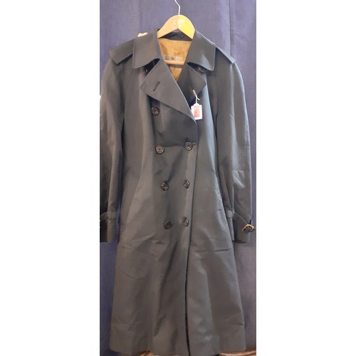 149 - A vintage Aquascutum navy rain mac sold by Harrods, 38/40