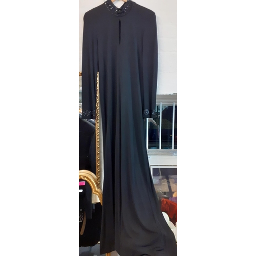 20 - Jean Muir-A late 20th Century black full length evening gown with black sequin collar and cuffs, 32