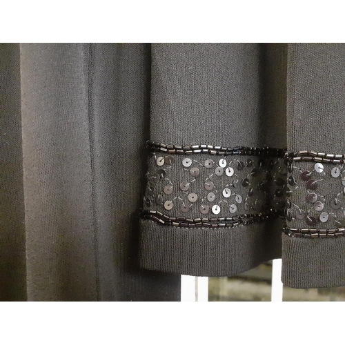 20 - Jean Muir-A late 20th Century black full length evening gown with black sequin collar and cuffs, 32