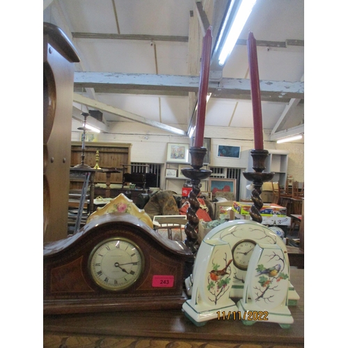 243 - An Edwardian Kendal & Dent mahogany mantel clock and later ceramic cased clocks together with a pair... 