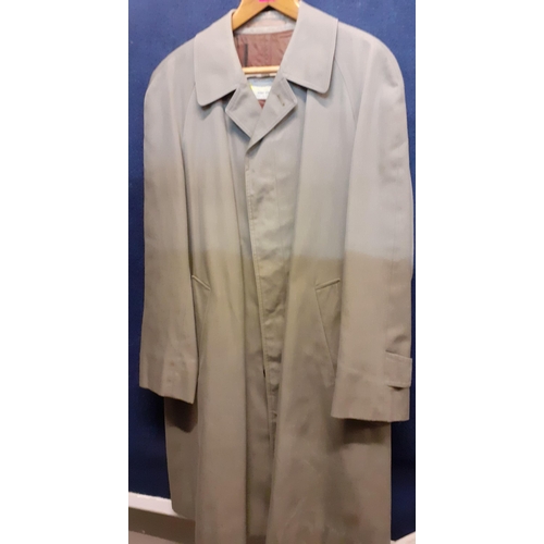 74 - A 1980's Aquascutum Aqua 5 grey/green raincoat having 2 deep internal pockets, 44