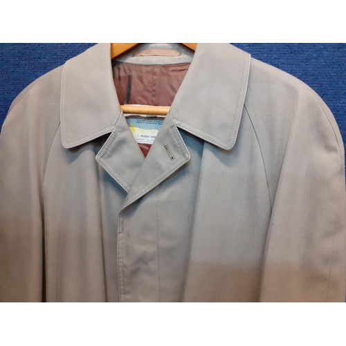 74 - A 1980's Aquascutum Aqua 5 grey/green raincoat having 2 deep internal pockets, 44