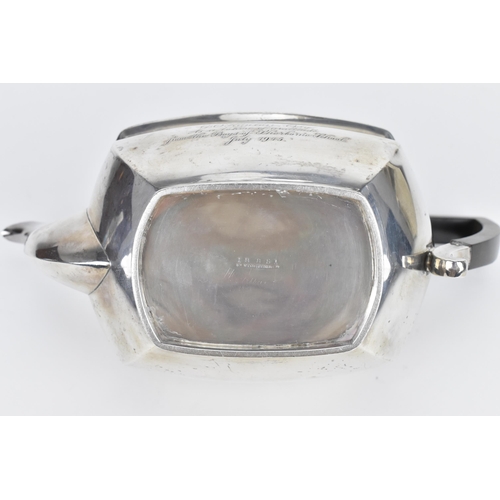 135 - An Edwardian silver teapot by Elkington & Co Ltd, Birmingham 1904, with gadrooned border, turned ebo... 