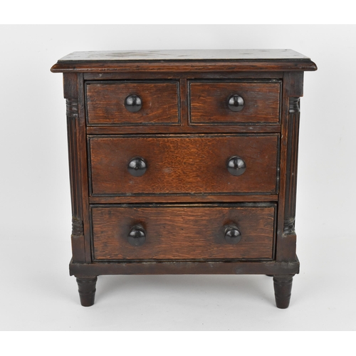 183 - A William IV mahogany miniature/apprentice chest of drawers, circa 1830, with moulded top above two ... 