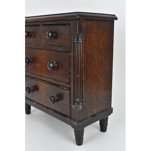 183 - A William IV mahogany miniature/apprentice chest of drawers, circa 1830, with moulded top above two ... 